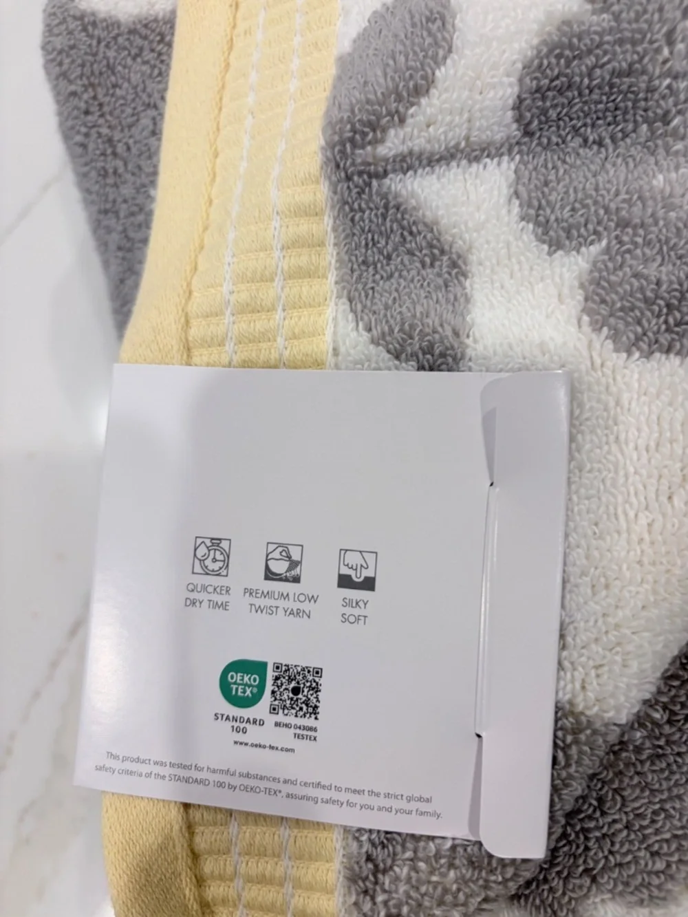 2 NWT Caro Bath Towels gray, yellow and white floral pattern